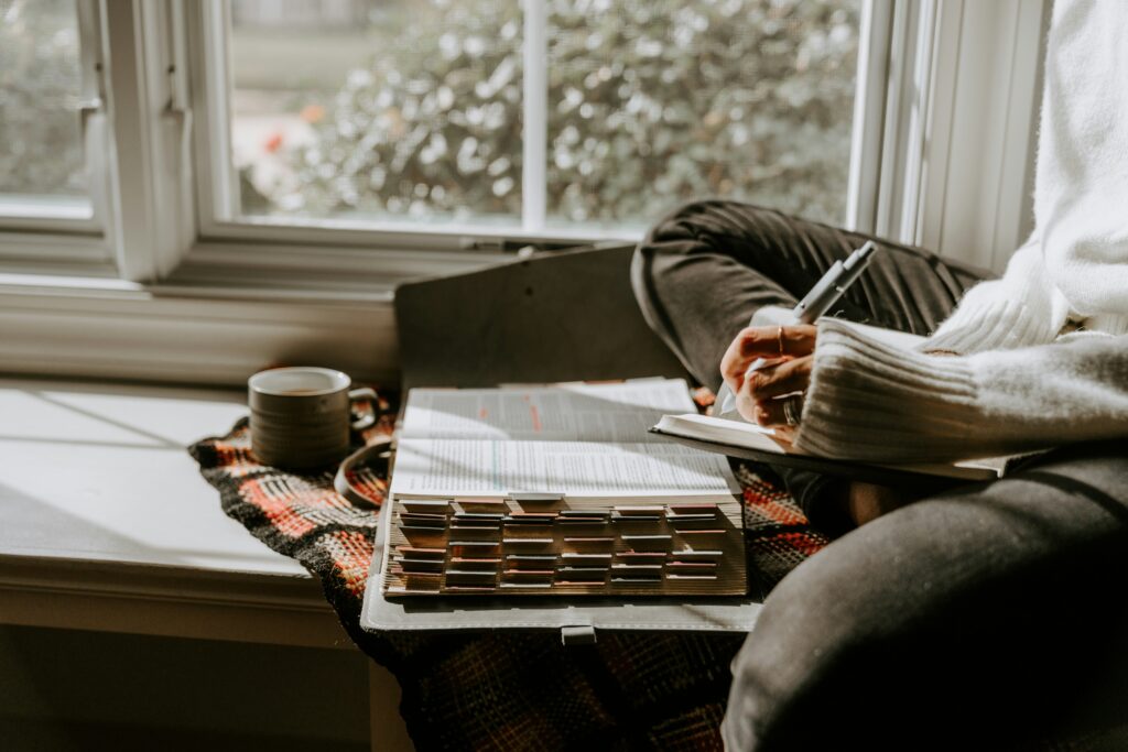 Woman writing in journal